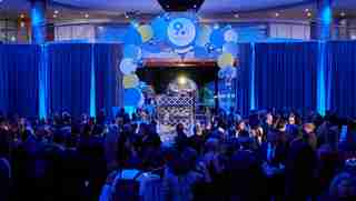 Guests mingle in Entry Hall during cocktail hour