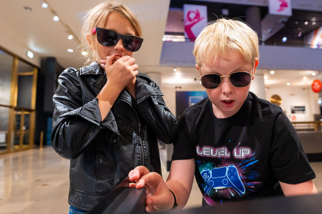 Kids unlock a safe in the Escape the Museum puzzle game